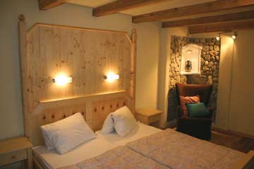ein Schlafzimmer in der Skihütte Gasteinertal